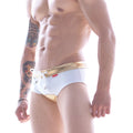 White swim trunks with gold mesh waistband and leg openings featuring a white drawstring tie from metromalewear