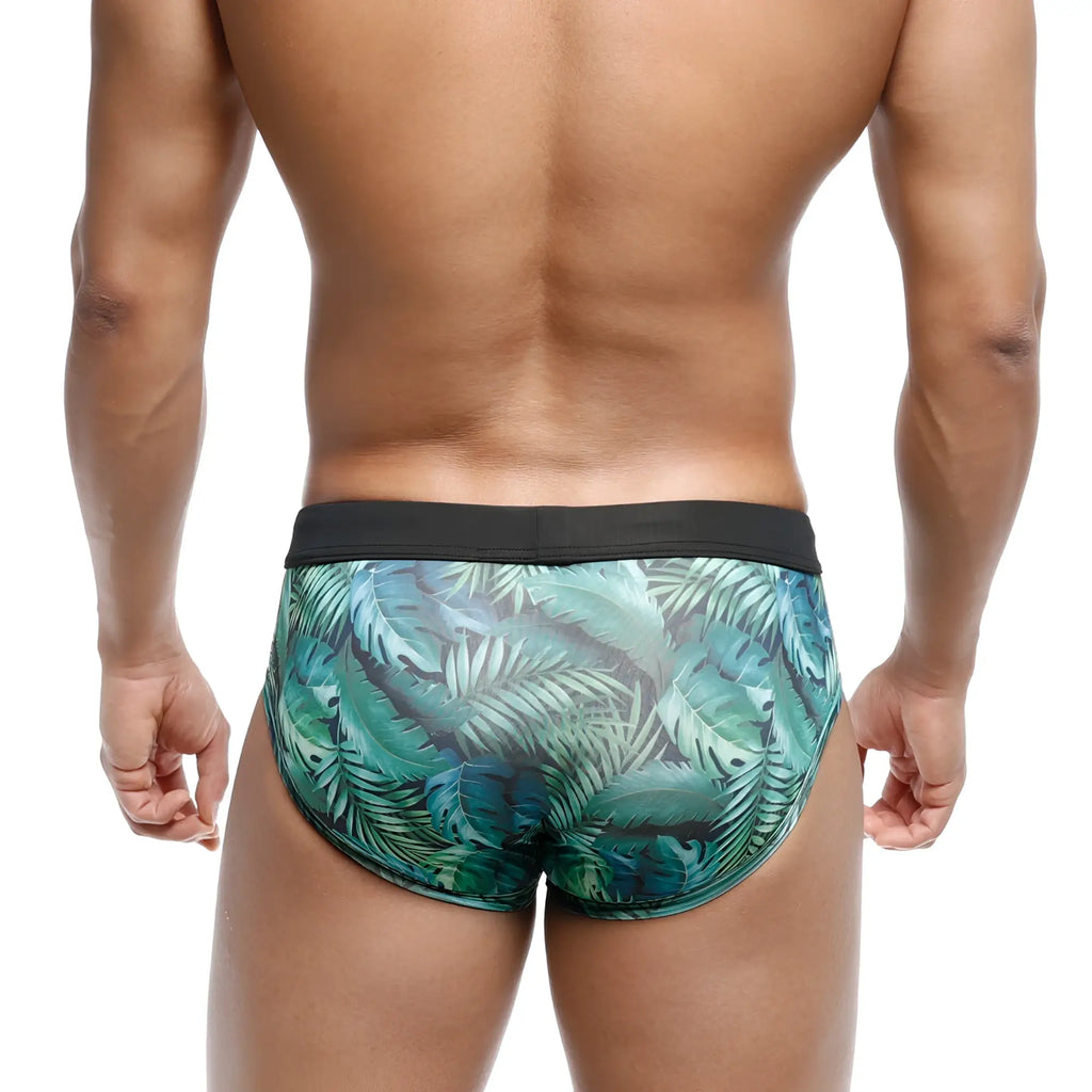 MetroMaleWear swim brief in green jungle with tropical leaf pattern and black waistband for men