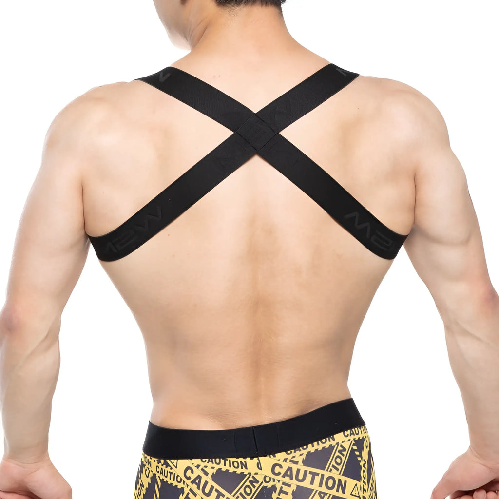 Black metro male wear tank top harness showing cross-back support strap with m2 branding