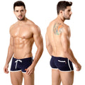 Navy blue MetroMaleWear terry swim trunks with white trim and front pocket ideal for casual beachwear