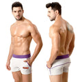 White MetroMaleWear terry sport shorts with purple waistband trim and orange logo on the side