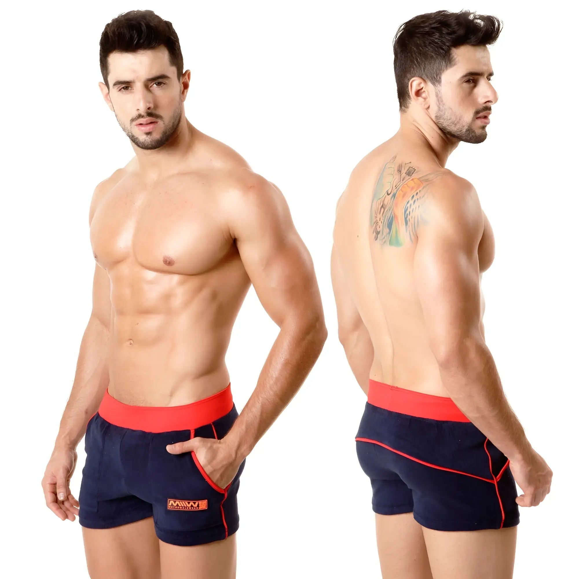 Navy blue terry sport shorts by MetroMaleWear with red elastic waistband side trim and small orange logo on lower left leg