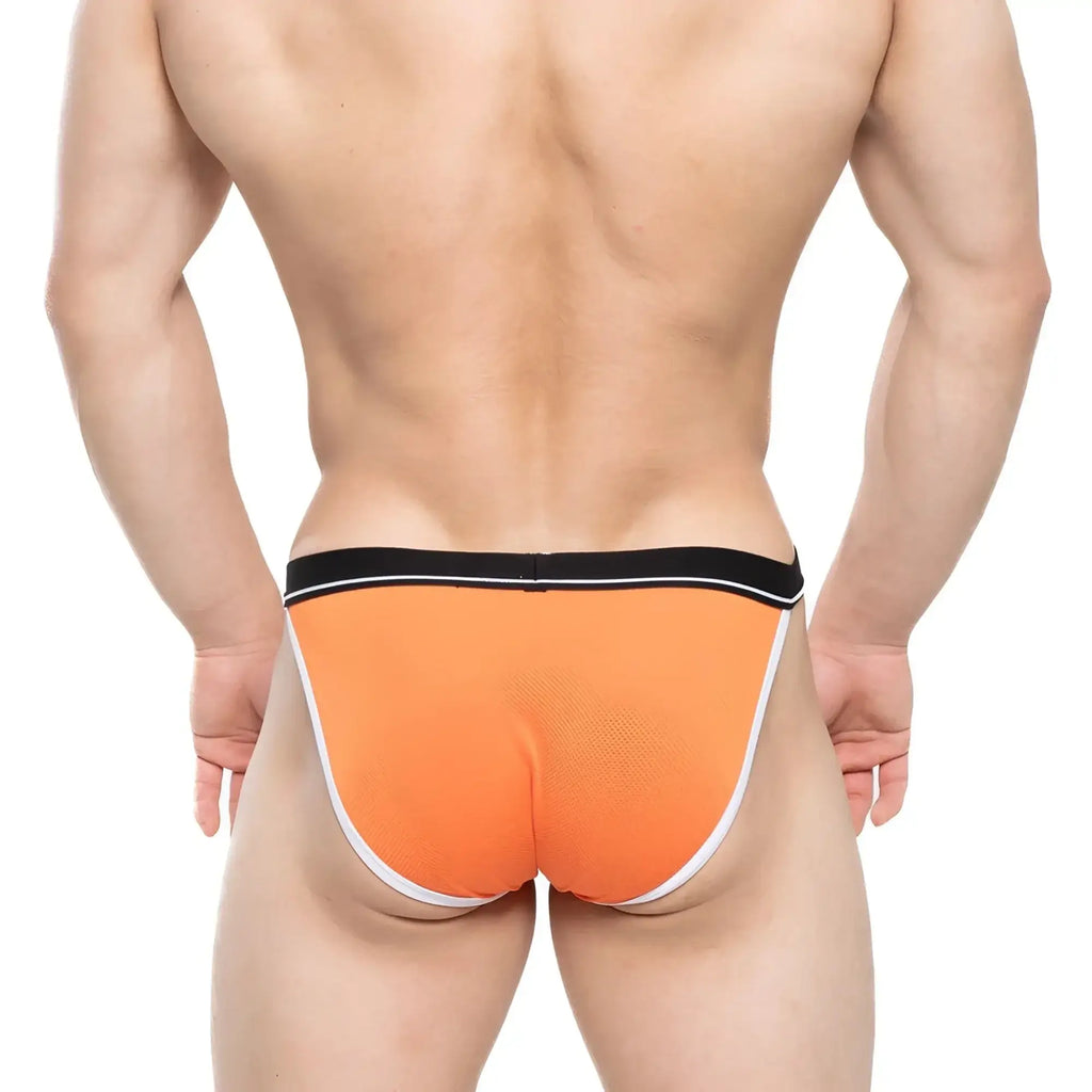 Bright orange metro male wear tomcat bikini briefs with black waistband and white trim for athletic use