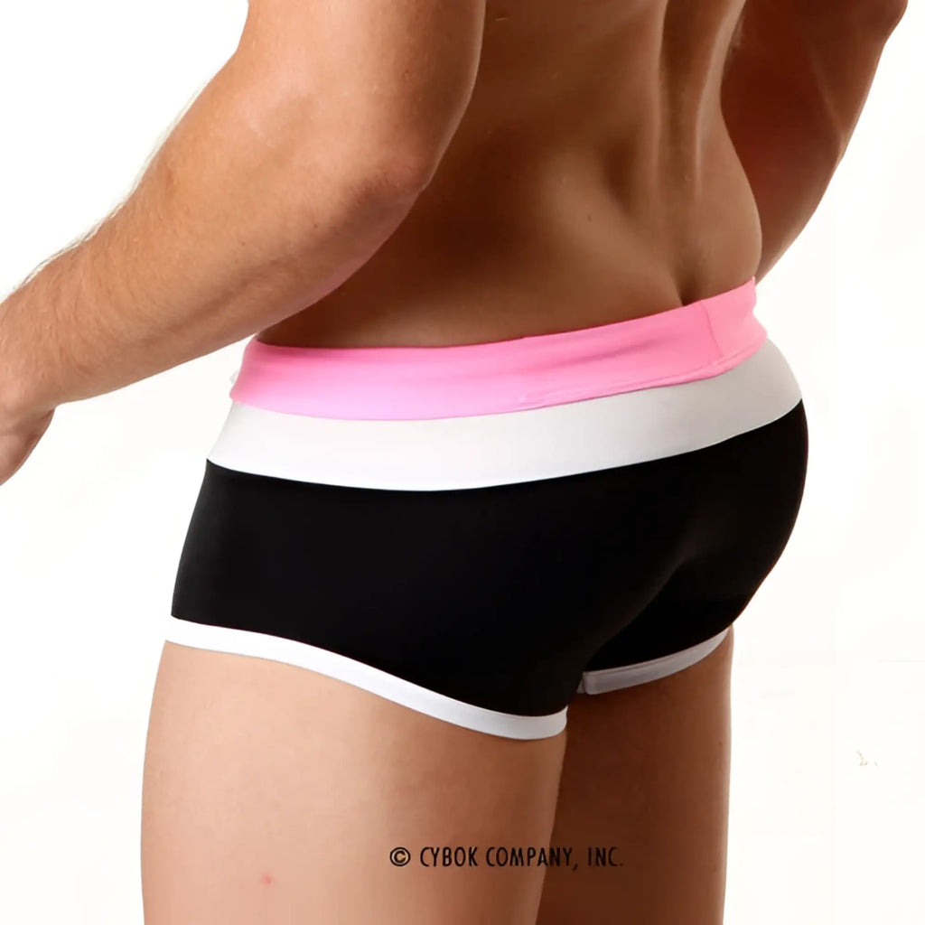 Black briefs from MetroMaleWear trio swim trunk pink 4913-02 with a bold pink and white striped waistband