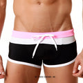 MetroMaleWear trio swim trunk pink 4913-02 featuring black and white stripes with bright pink waistband and white drawstring