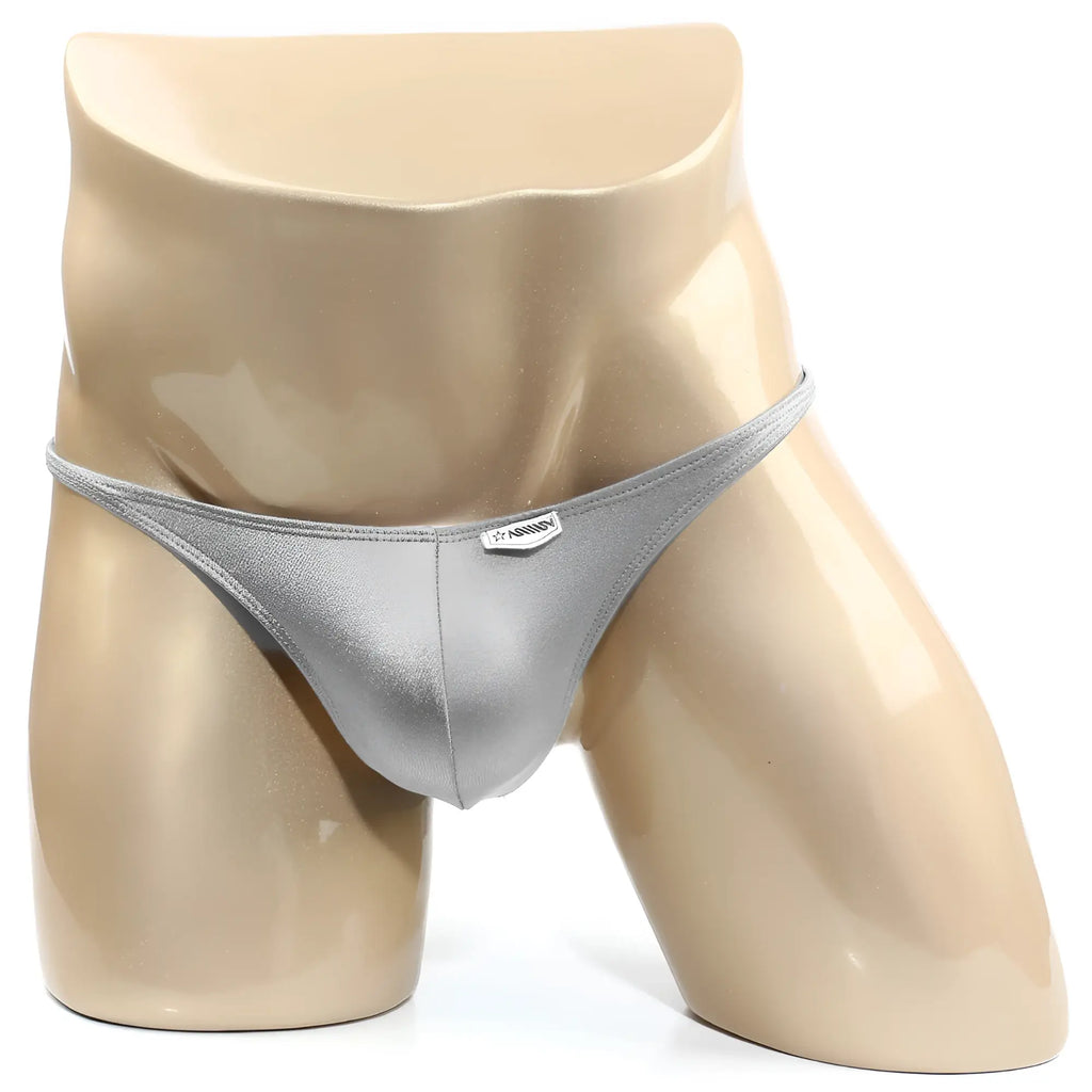 Silver metallic trozo bikini thong with a small rectangular MetroMaleWear brand tag on the front