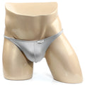 Silver metallic trozo bikini thong with a small rectangular MetroMaleWear brand tag on the front