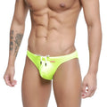 Bright neon green MetroMaleWear Vanguard swim bikini with white drawstrings and red brand tag for stylish beachwear
