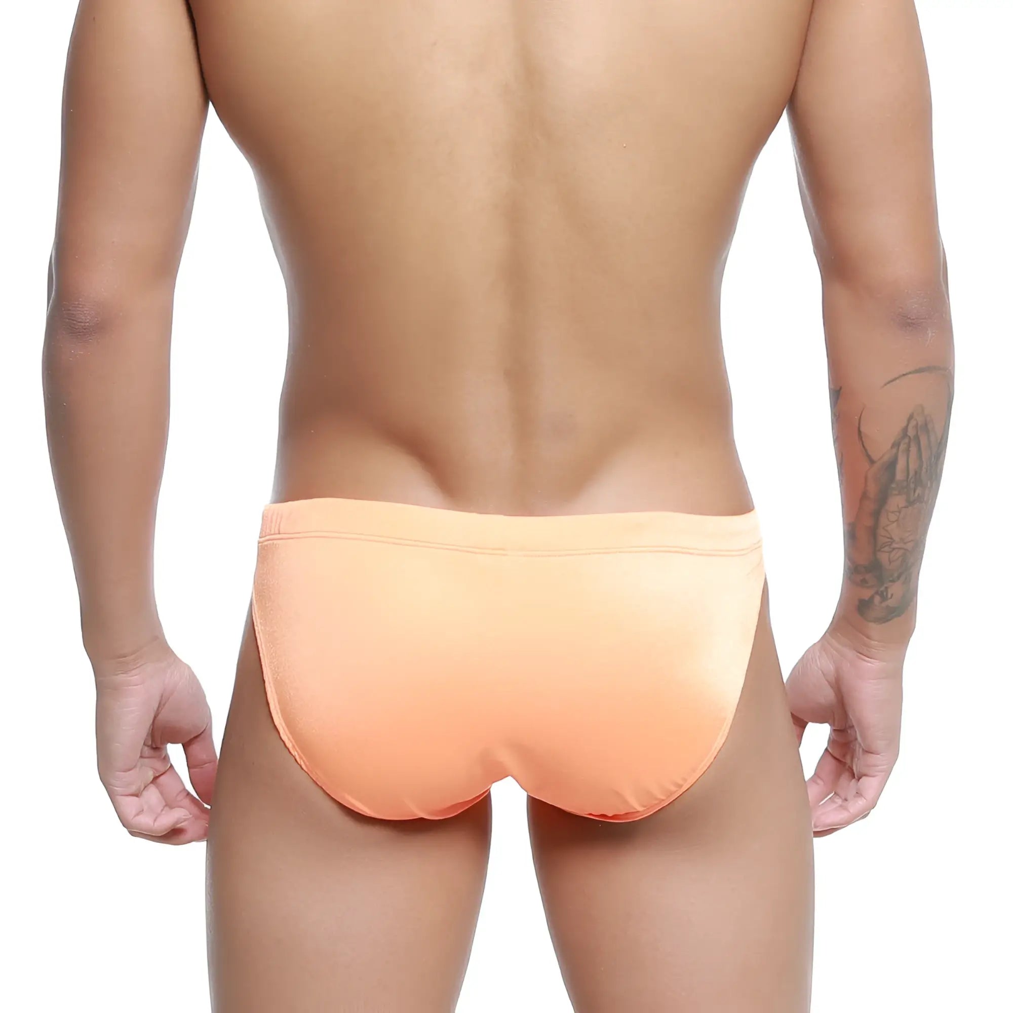 MetroMaleWear Vanguard swim bikini in neon orange with smooth form-fitting fabric and snug waistband