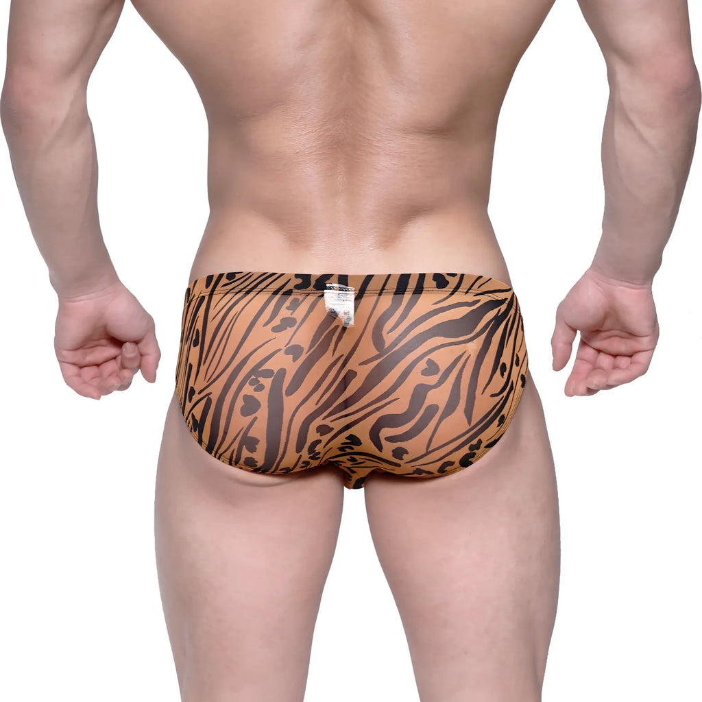 Orange and black tiger-striped swim trunks metroMalewear vasco hip brief animal gold 5103-75 highlighting bold pattern