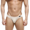 Beige metroMalewear Vasco hip brief men’s thong with black logo tag on waistband in soft fabric