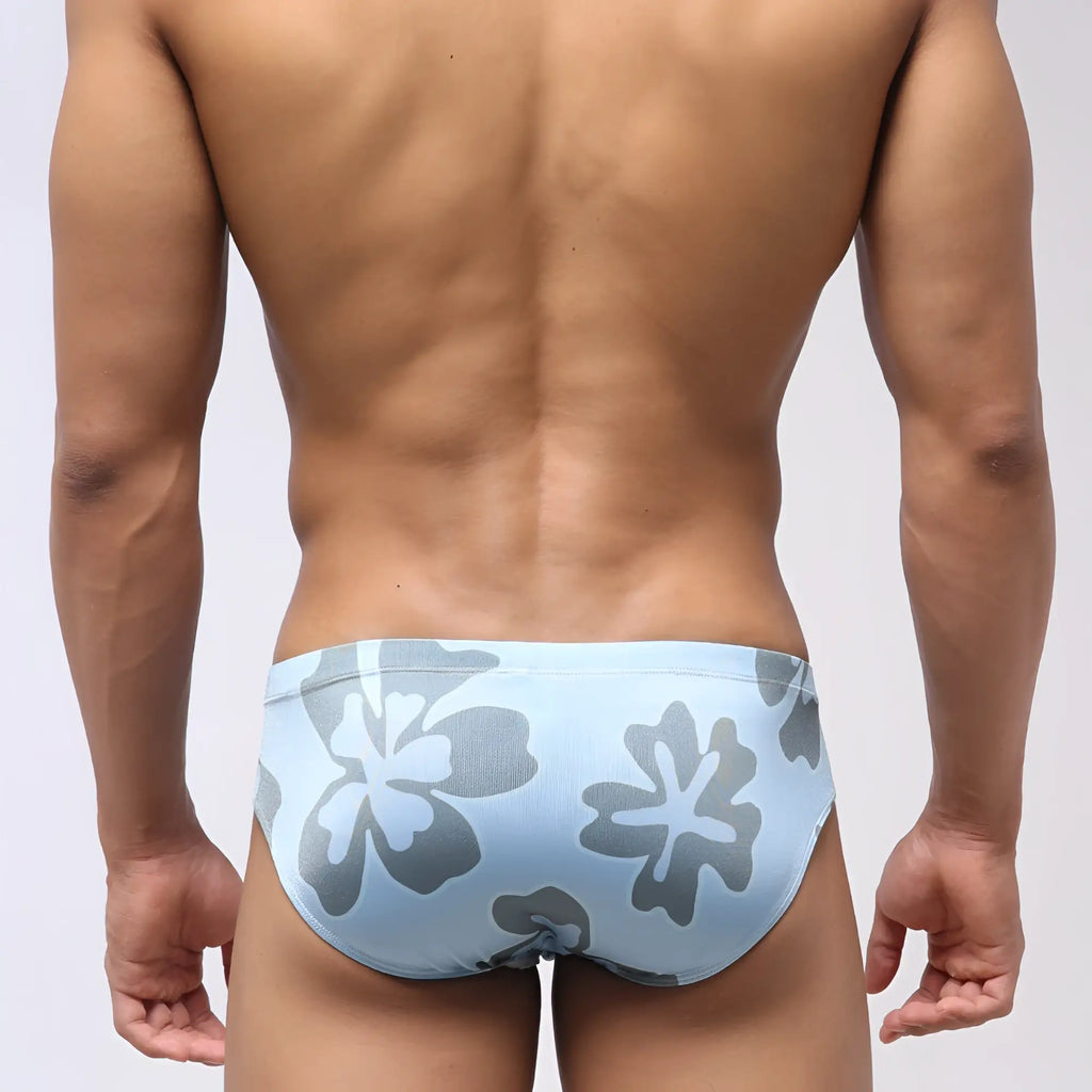 Light blue MetroMaleWear Vasco swim brief with gray and white floral pattern designed for comfortable beachwear