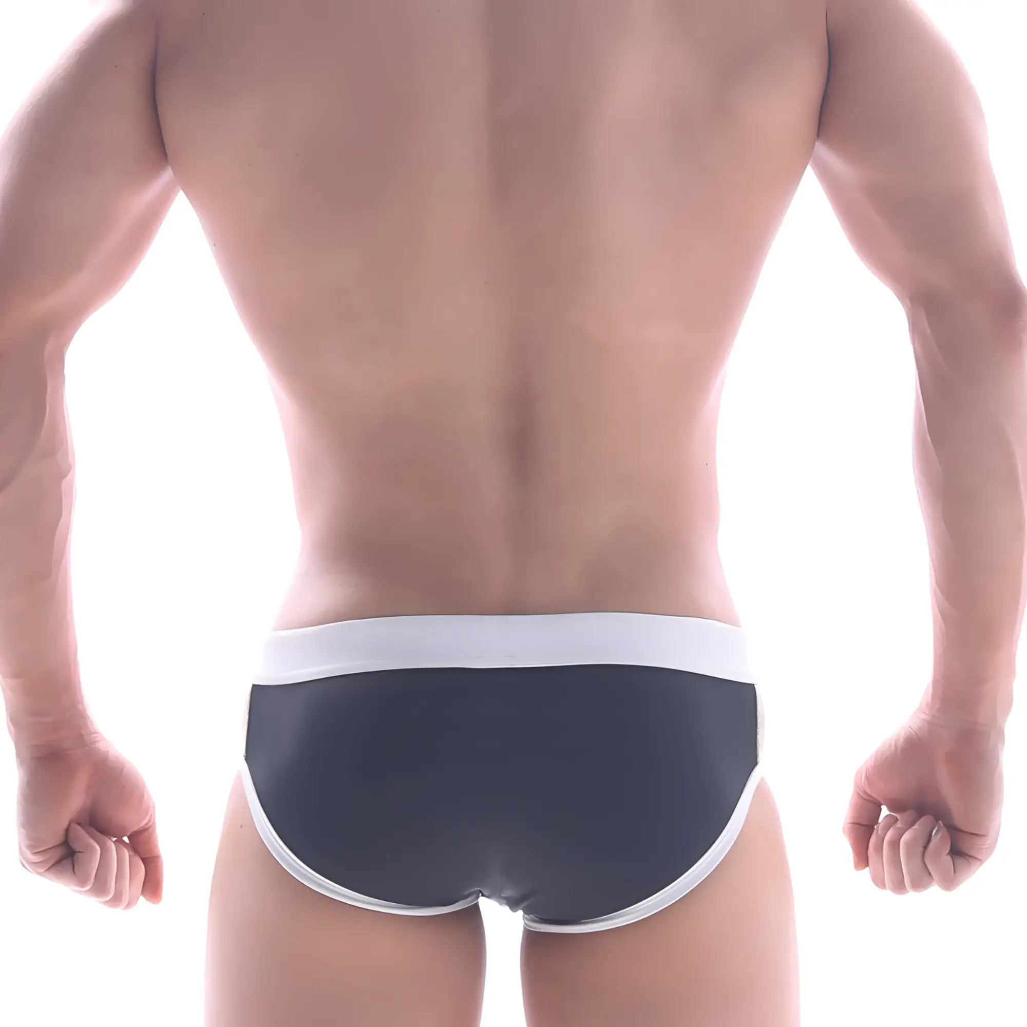 MetroMaleWear Ventana swim brief in black with white trim featuring breathable quick-dry fabric for active use