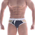 MetroMaleWear Ventana swim brief in navy blue and white with gold mesh panels and drawstring waistband