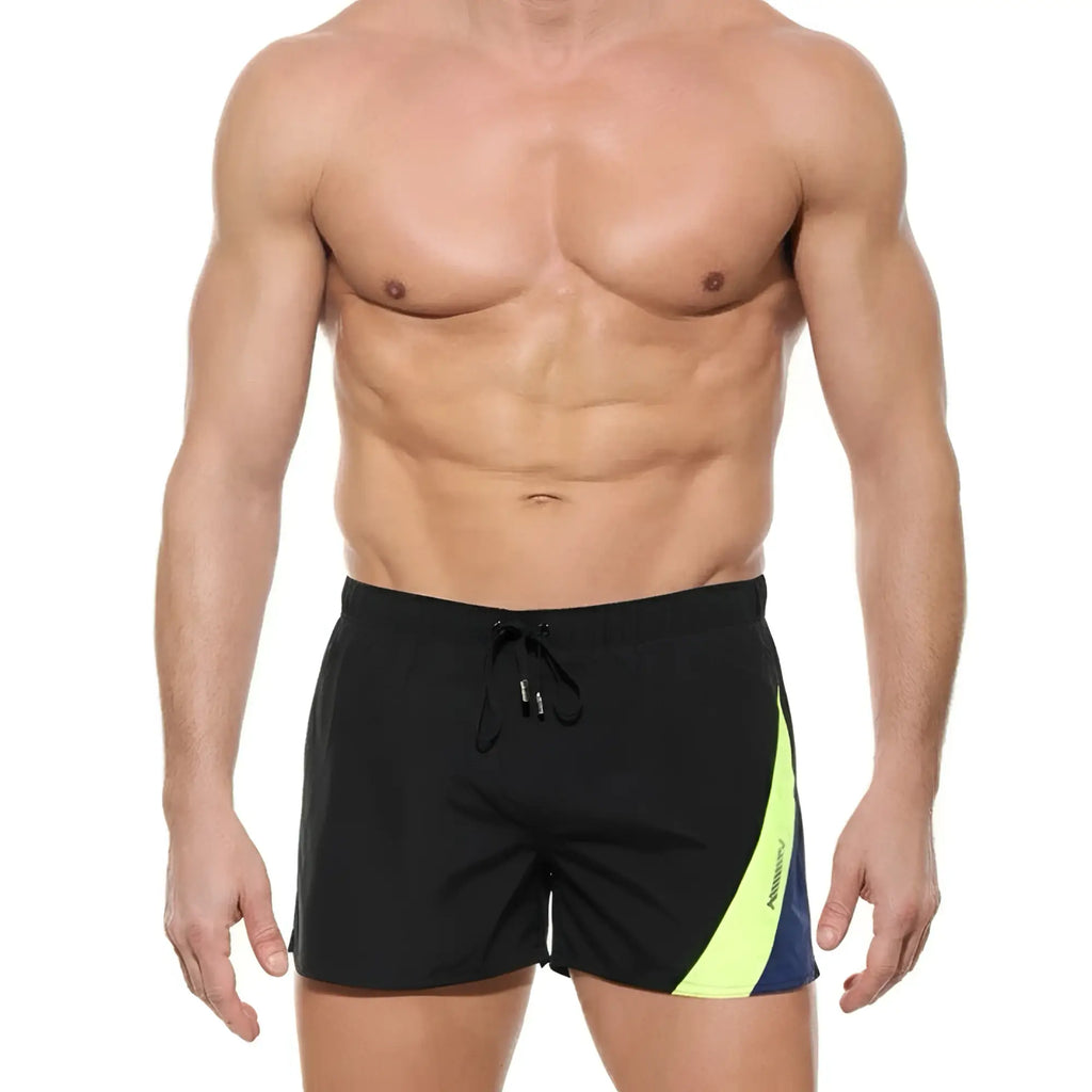 Black MetroMaleWear Viena short swim trunks with neon yellow and navy blue diagonal side stripe for men