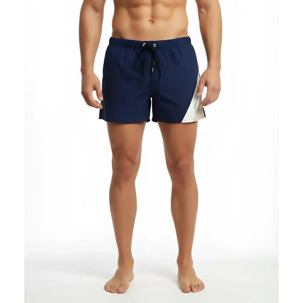Navy blue MetroMaleWear Viena short swim trunks with white diagonal panel and black drawstring for casual wear