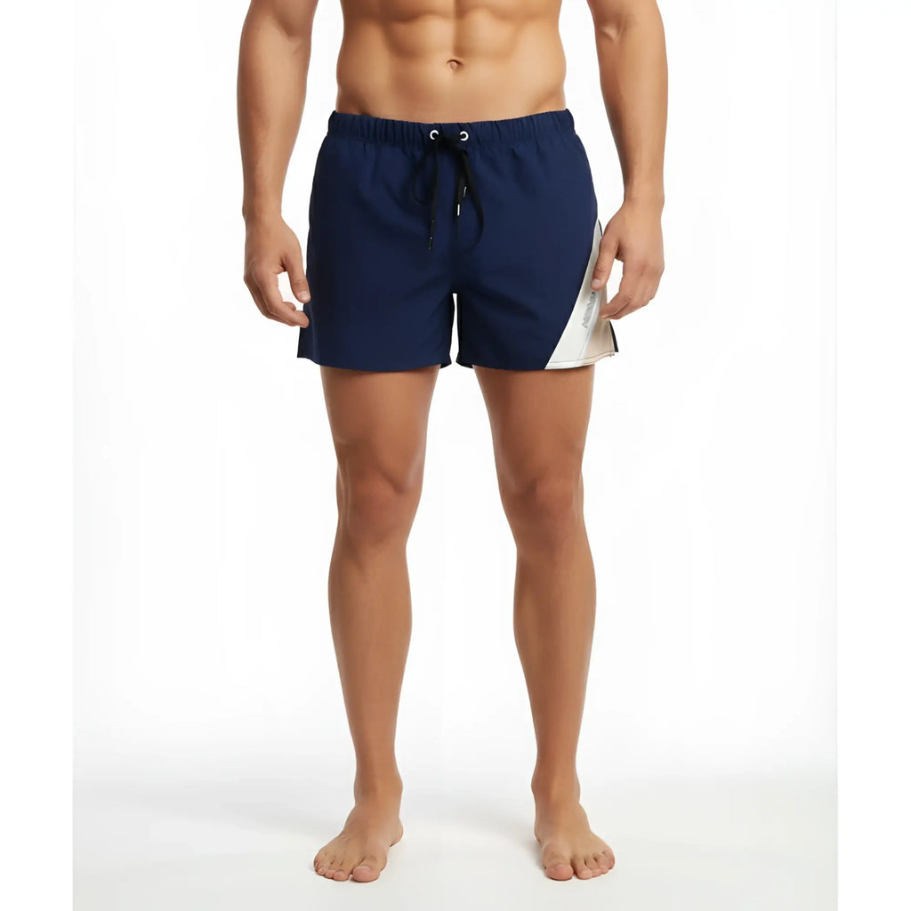 Navy blue MetroMaleWear Viena short swim trunks with white diagonal panel and black drawstring for casual wear
