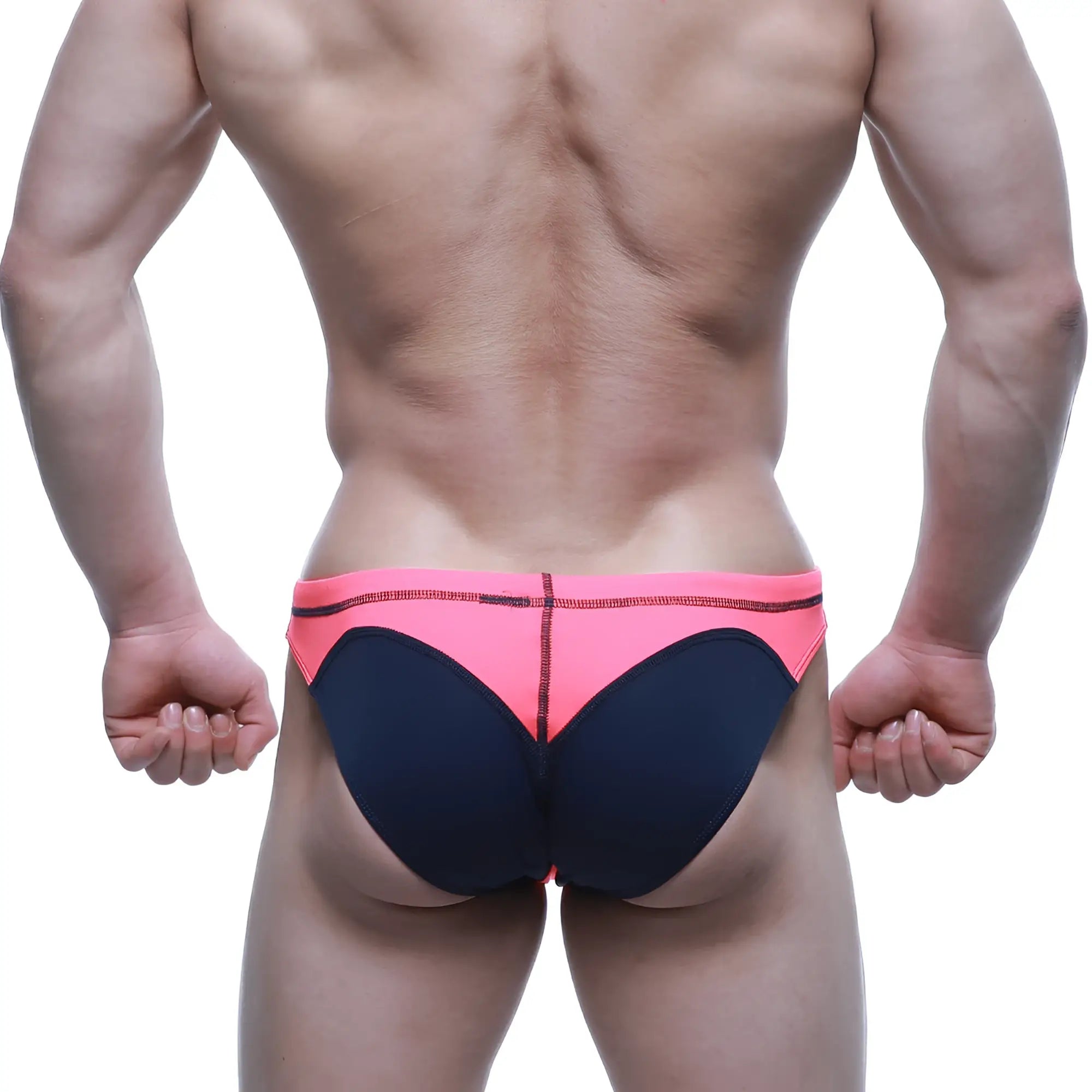 Bright pink and navy blue neon swim bikini by metromalewear with bold color-block design for swimwear use