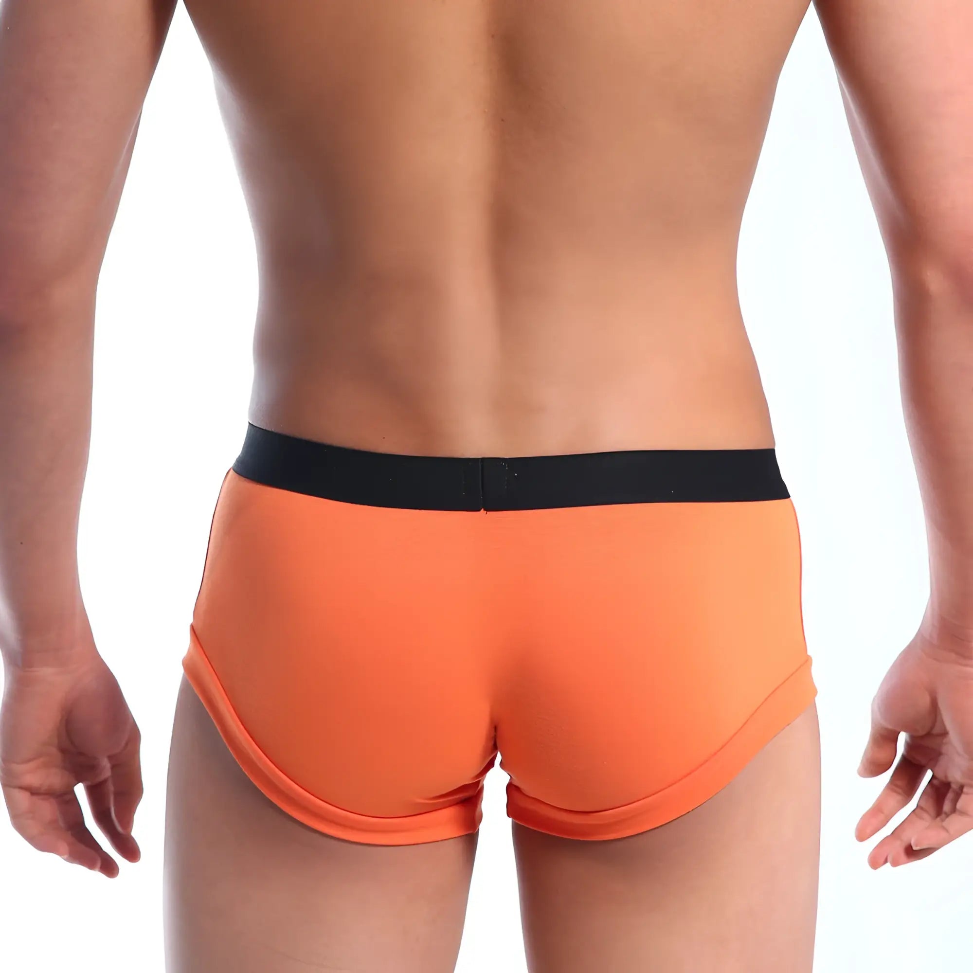 Orange briefs with a black elastic waistband by metromalewear model 2110-14 designed for comfortable wear