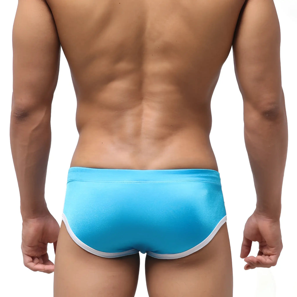 Bright blue metroMalewear wave swim brief with white trim designed for comfortable swimming and water activities