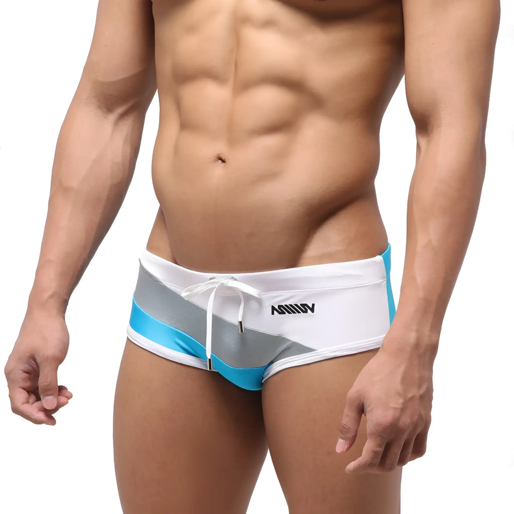 MetroMaleWear wave swim brief gray 4918-10 features white silver and turquoise striped swim trunks with drawstring waistband