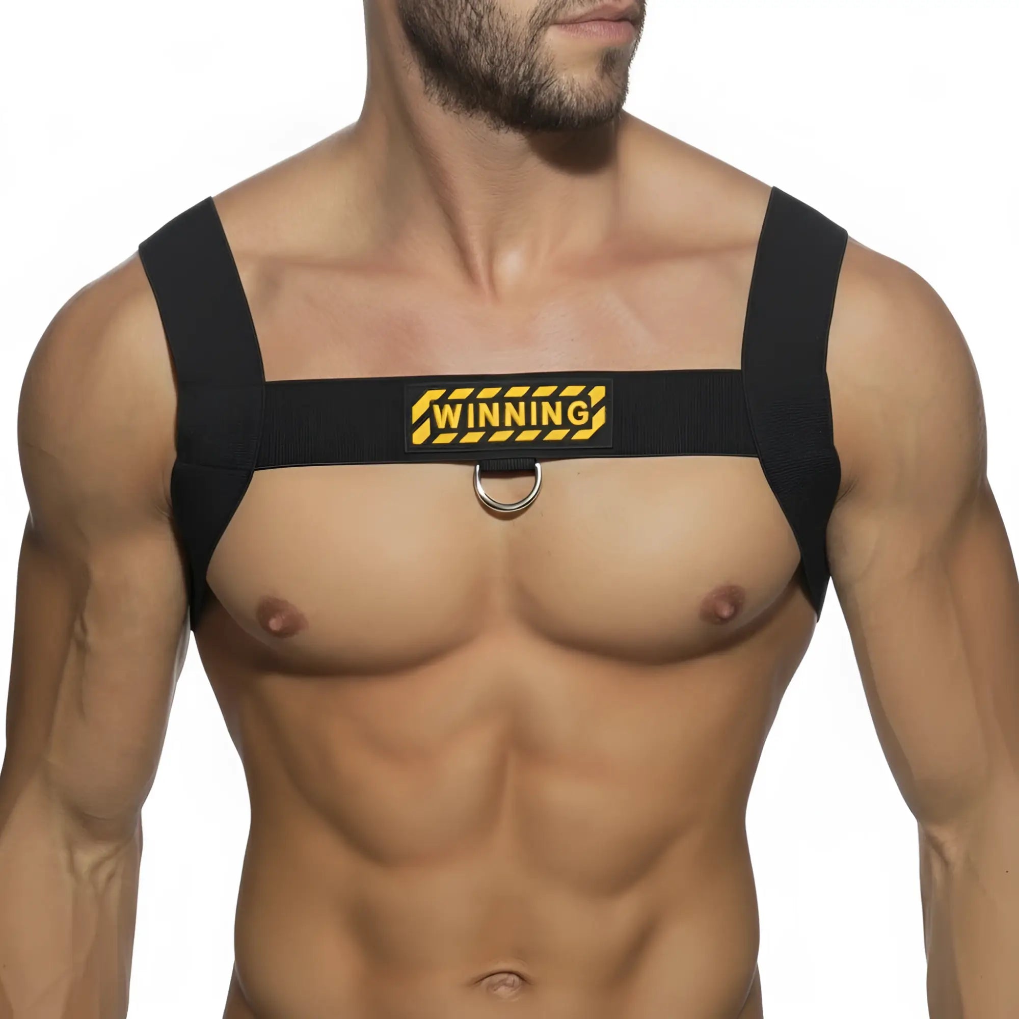 Black fabric chest harness by metromalewear with yellow winning logo and metal ring elastic body harness