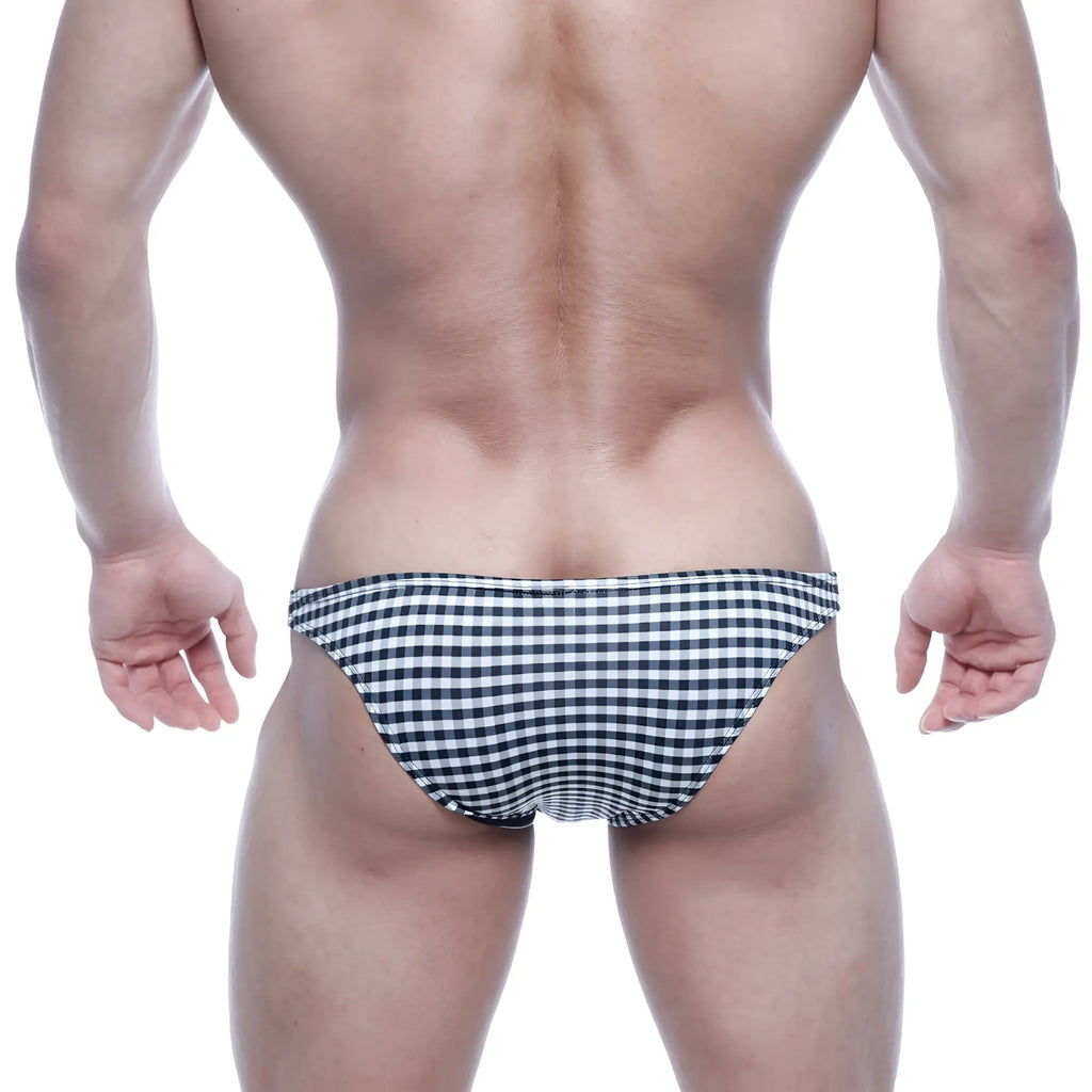 MetroMalewear xtreme bikini black plaid swim trunks feature a black and white checkered pattern for bold style