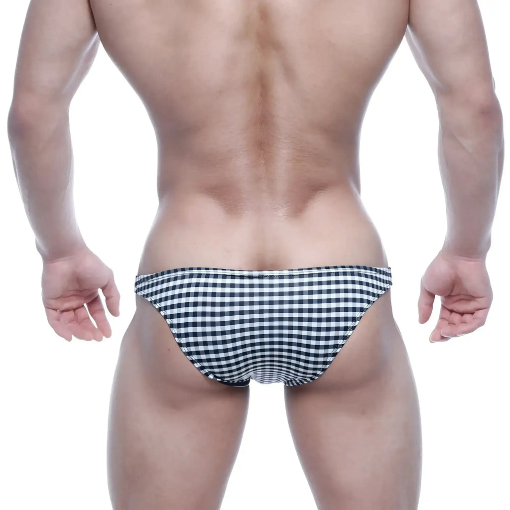 MetroMalewear xtreme bikini black plaid swim trunks feature a black and white checkered pattern for bold style