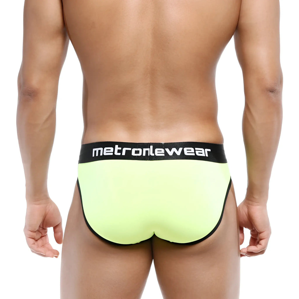 Bright neon yellow metroMalewear martini brief with black trim and waistband featuring white logo lettering