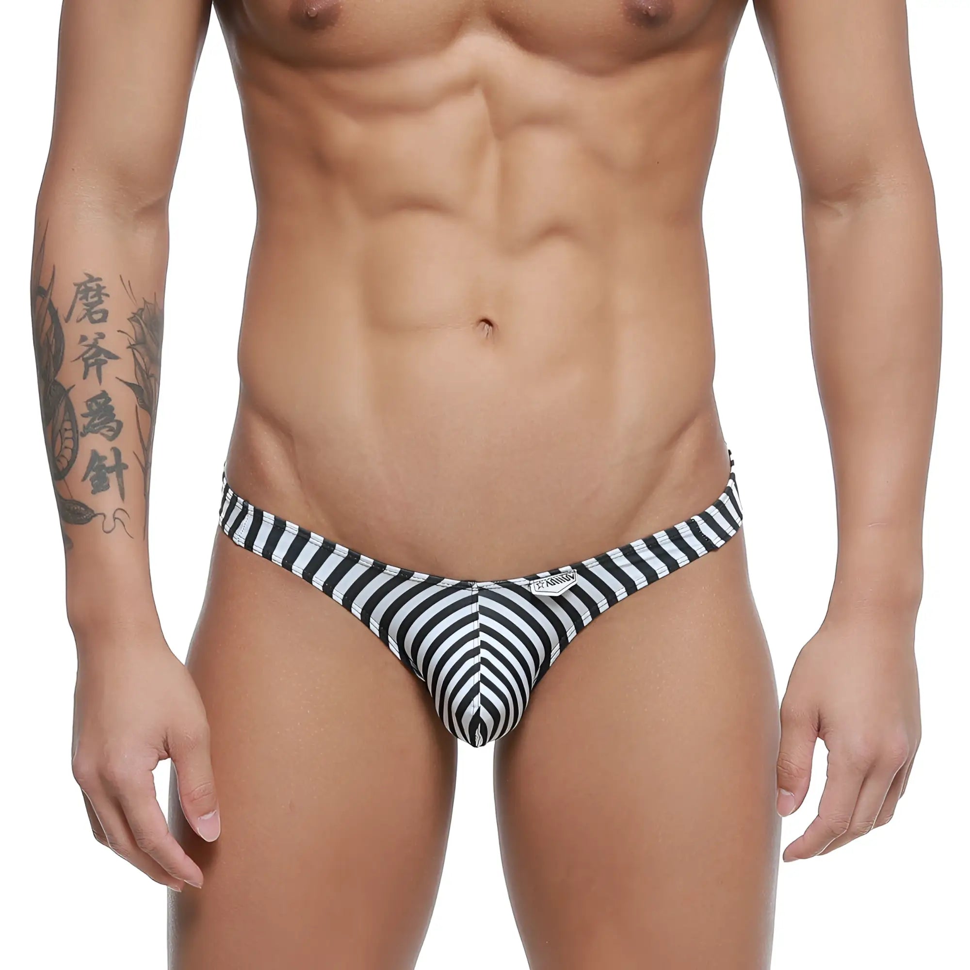 Black and white striped men’s swim trunks with a snug contoured design from MetroMaleWear max bulge bikini jail 6007-40