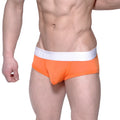 Bright orange MetroMaleWear Max Contour athletic briefs with white elastic waistband and makromat branding