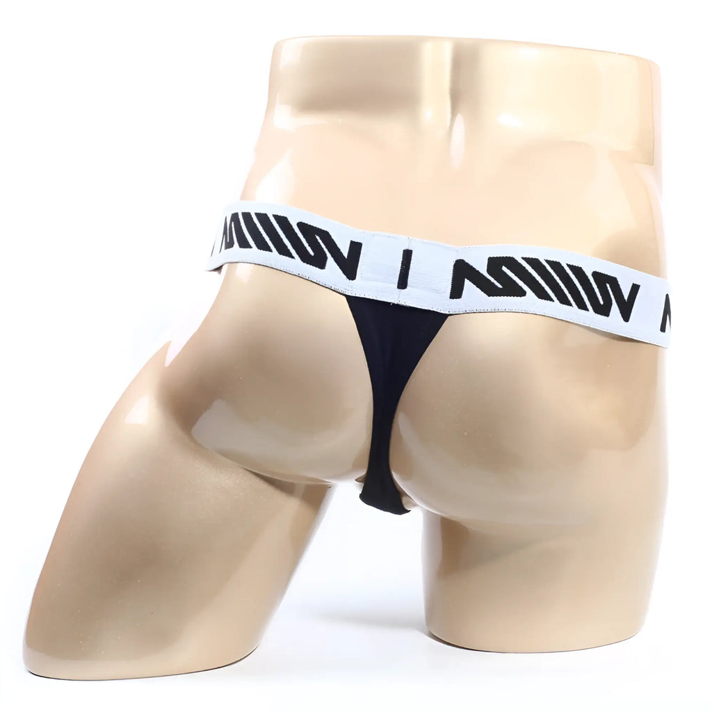 Black MetroMaleWear Max Thong 3202-21 with white elastic waistband and bold black lettering
