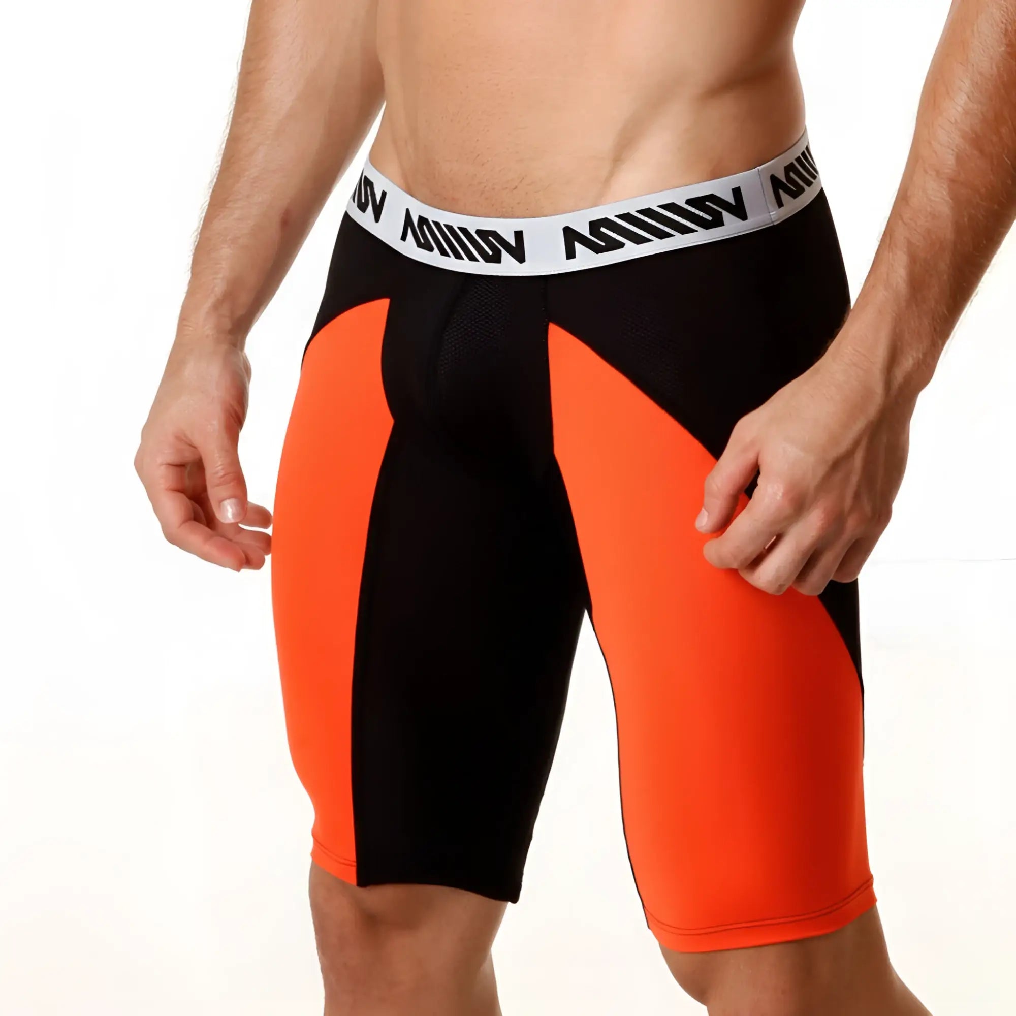 Black and orange mesh athletic shorts with white waistband featuring million branding metroMalewear 15 inch long short