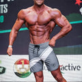 Gray and white MetroMaleWear MetroMuscleWear charcoal athletic shorts with diagonal stripes black drawstrings and logo