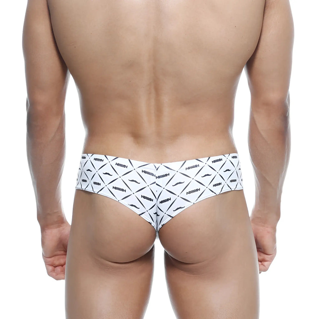White briefs with bold black geometric mustache pattern and arrow brand print metro malewear micro cheek caballero 2027-03