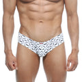 White men’s swim trunks with bold black geometric mustache pattern and arrow brand name metroMalewear micro cheek caballero 2027-03