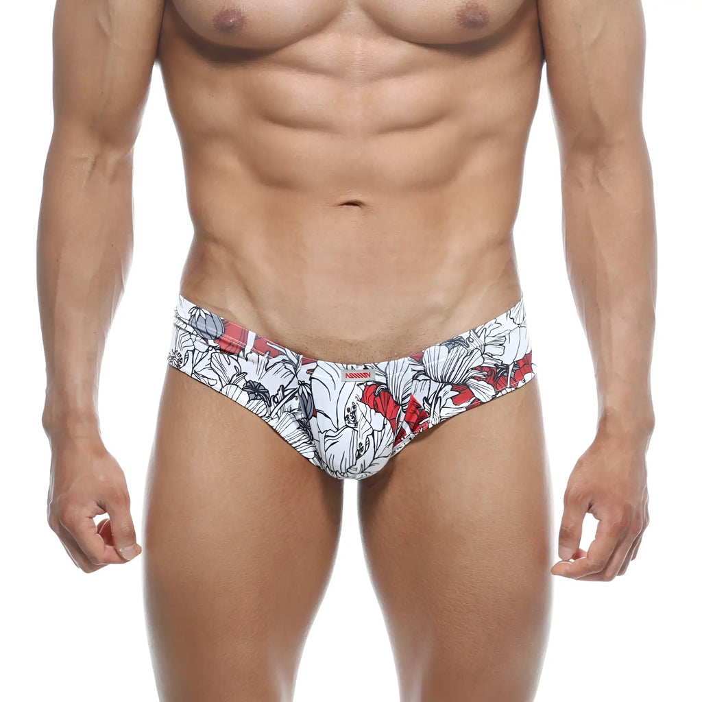 White and red floral-patterned men’s briefs with bold graphic design micro cheek style by metromalewear