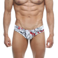 White and red floral-patterned men’s briefs with bold graphic design micro cheek style by metromalewear