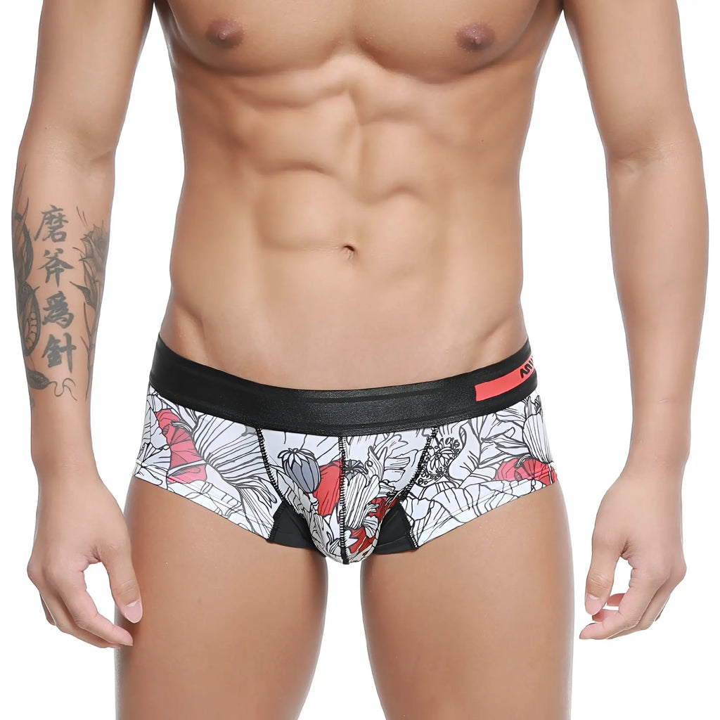 White briefs metroMalewear micro mini boxer escobar 7013-03 with bold red and black floral pattern and black waistband