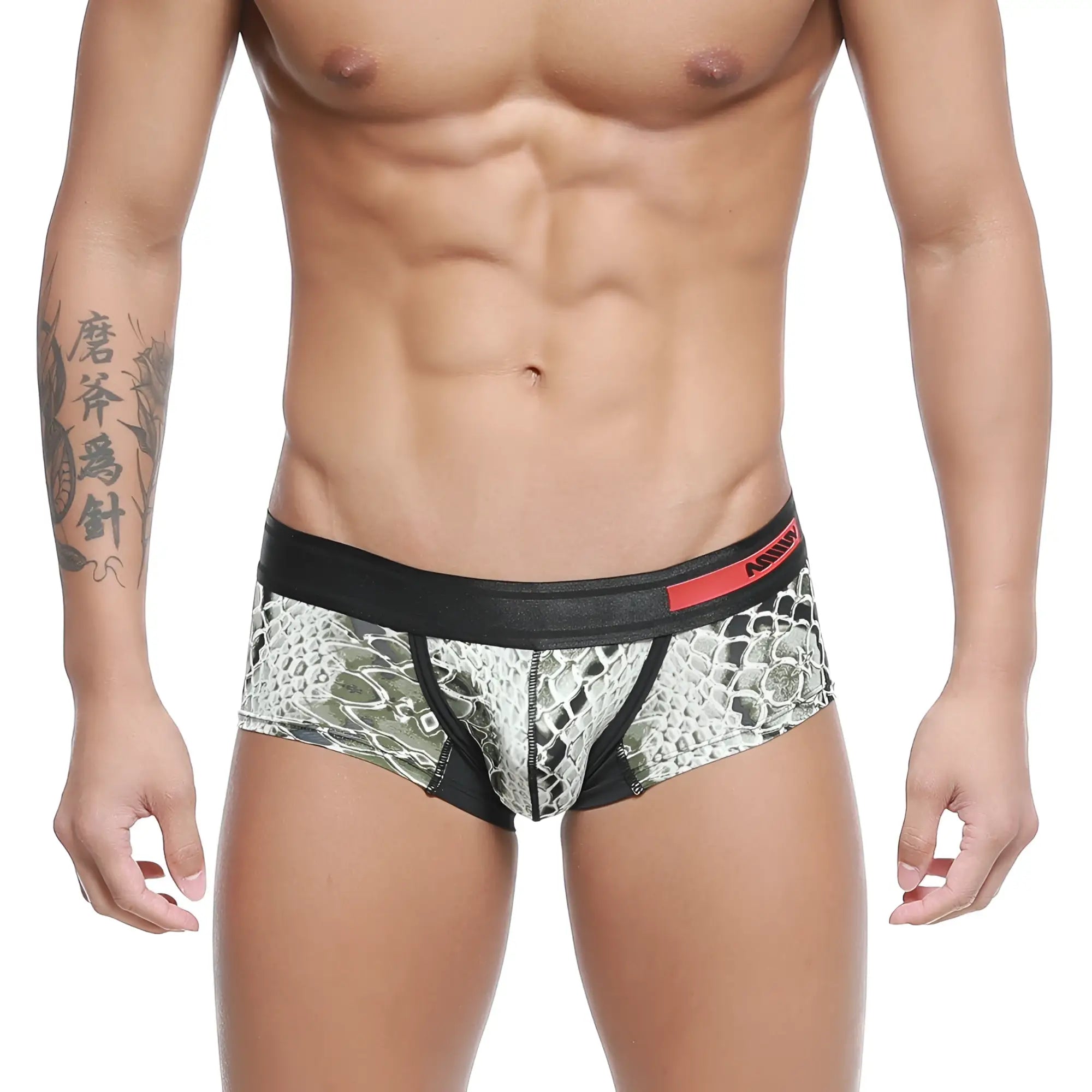 Black and white snake-scale patterned mens briefs with a red metro male wear logo on the waistband