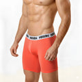 MetroMaleWear microfiber men’s boxer briefs in coral orange with a white waistband featuring black text