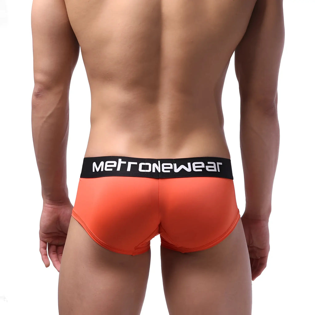 Bright orange microfiber men’s briefs with black metallinewear waistband for comfortable everyday wear