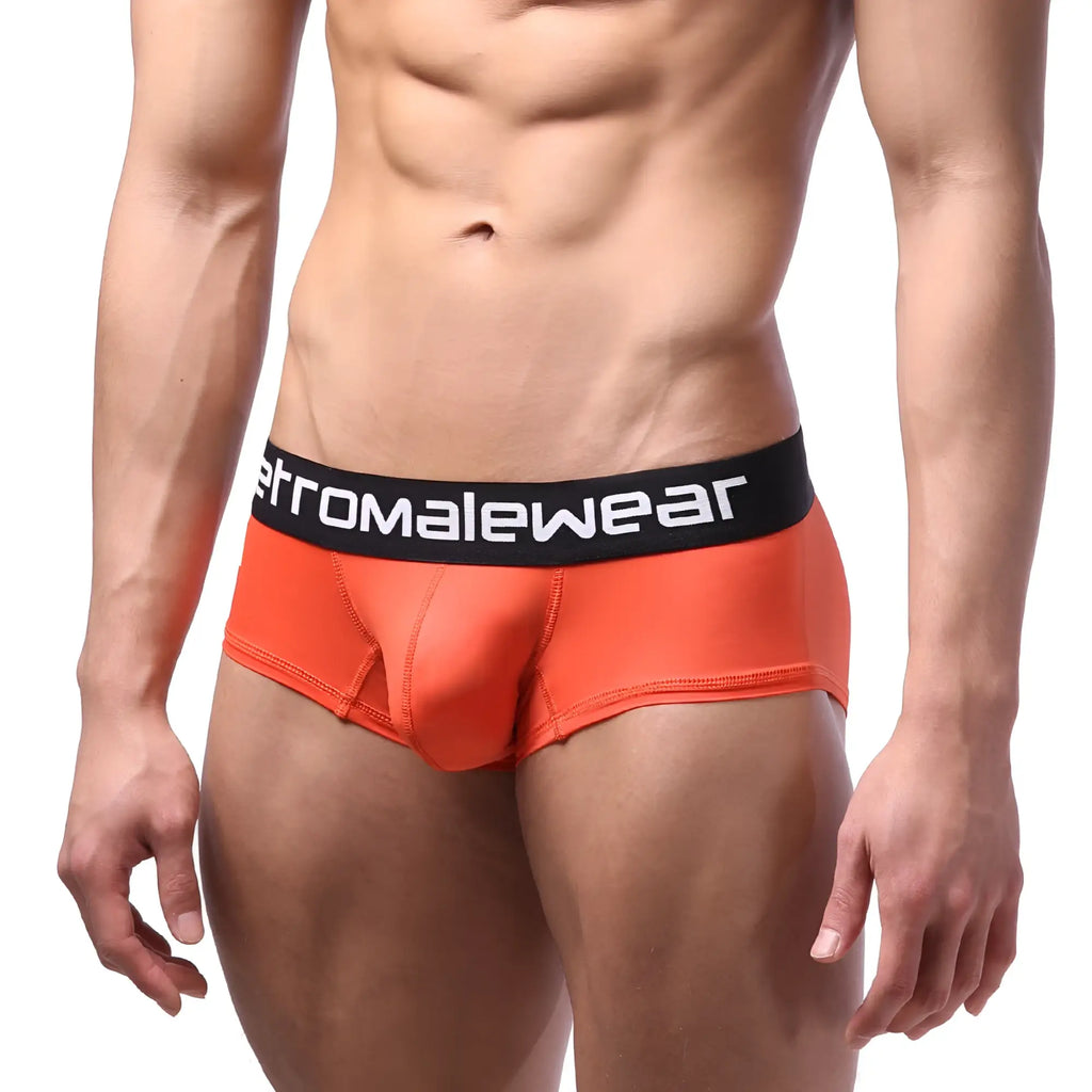 Bright orange microfiber men’s briefs with black waistband and metromalewear logo in white lettering coral 7013-13
