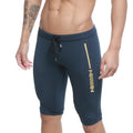 Dark blue metro malewear mojave biker athletic shorts with gold stripe logo and elastic waistband with drawstring