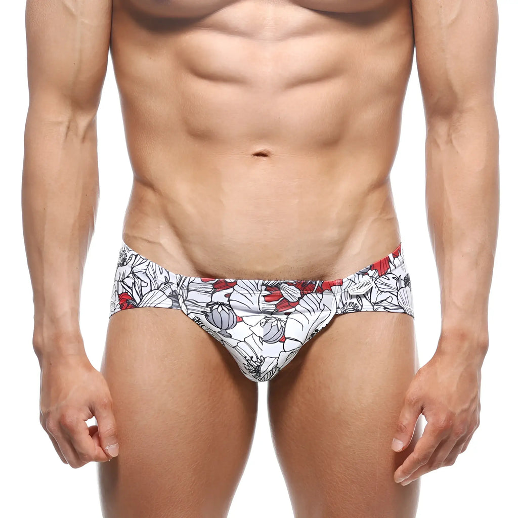 White swim trunks metroMalewear mojito bikini escobar 1006-09 with bold red and gray floral pattern