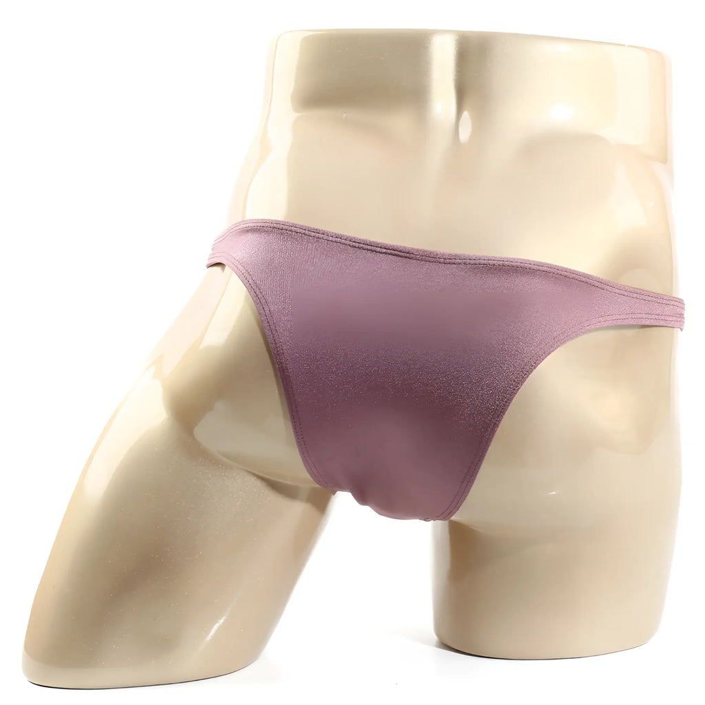 A shimmering mauve satin thong from metro male wear monaco bikini lilac 6010-03 displayed on a mannequin