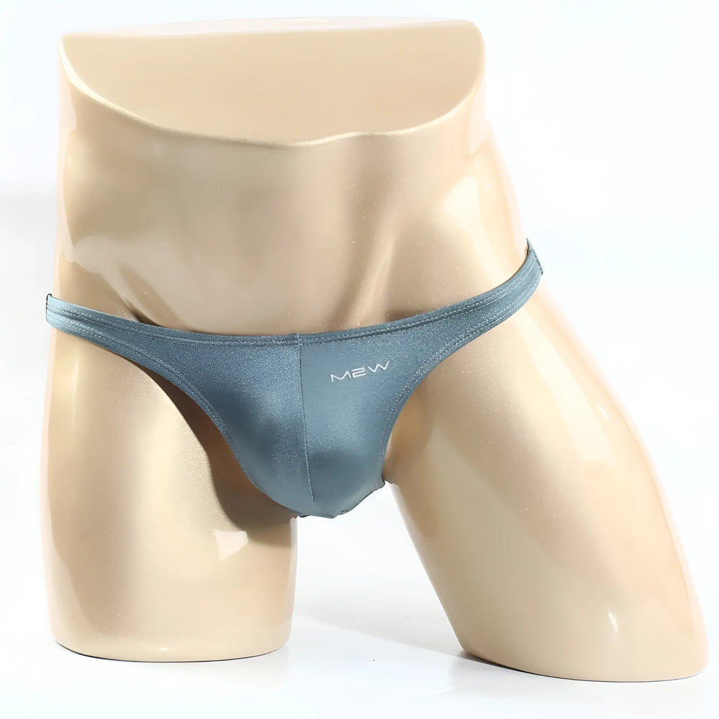 MetroMaleWear Monaco bikini thong in teal made of smooth shiny fabric with a sleek, modern design