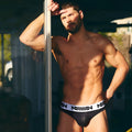 MetroMaleWear Nasca Brief black briefs with white elastic waistband featuring milan logo in bold black lettering