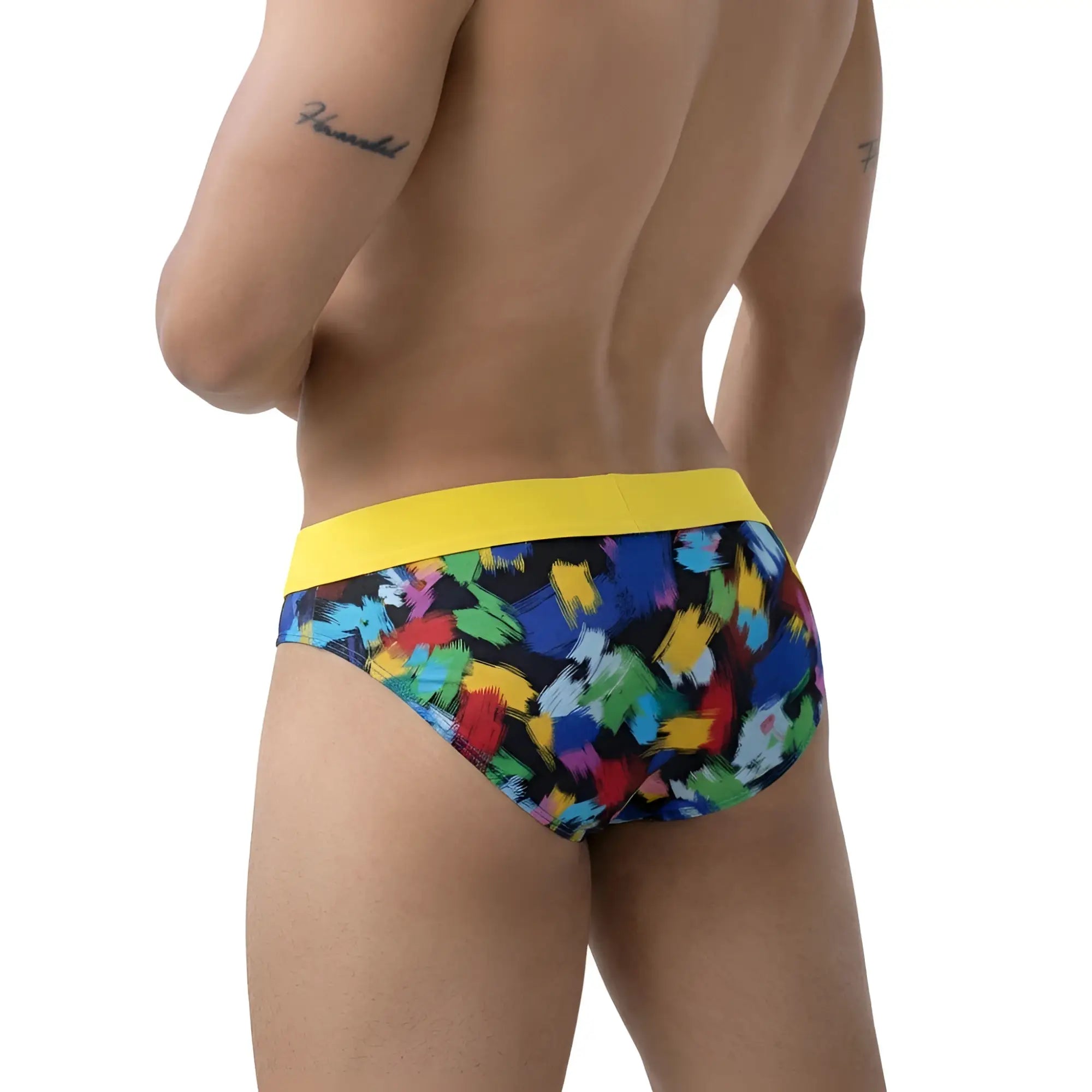 MetroMaleWear Nasca brief yellow with vibrant abstract paint-splatter pattern and bold yellow waistband in front view