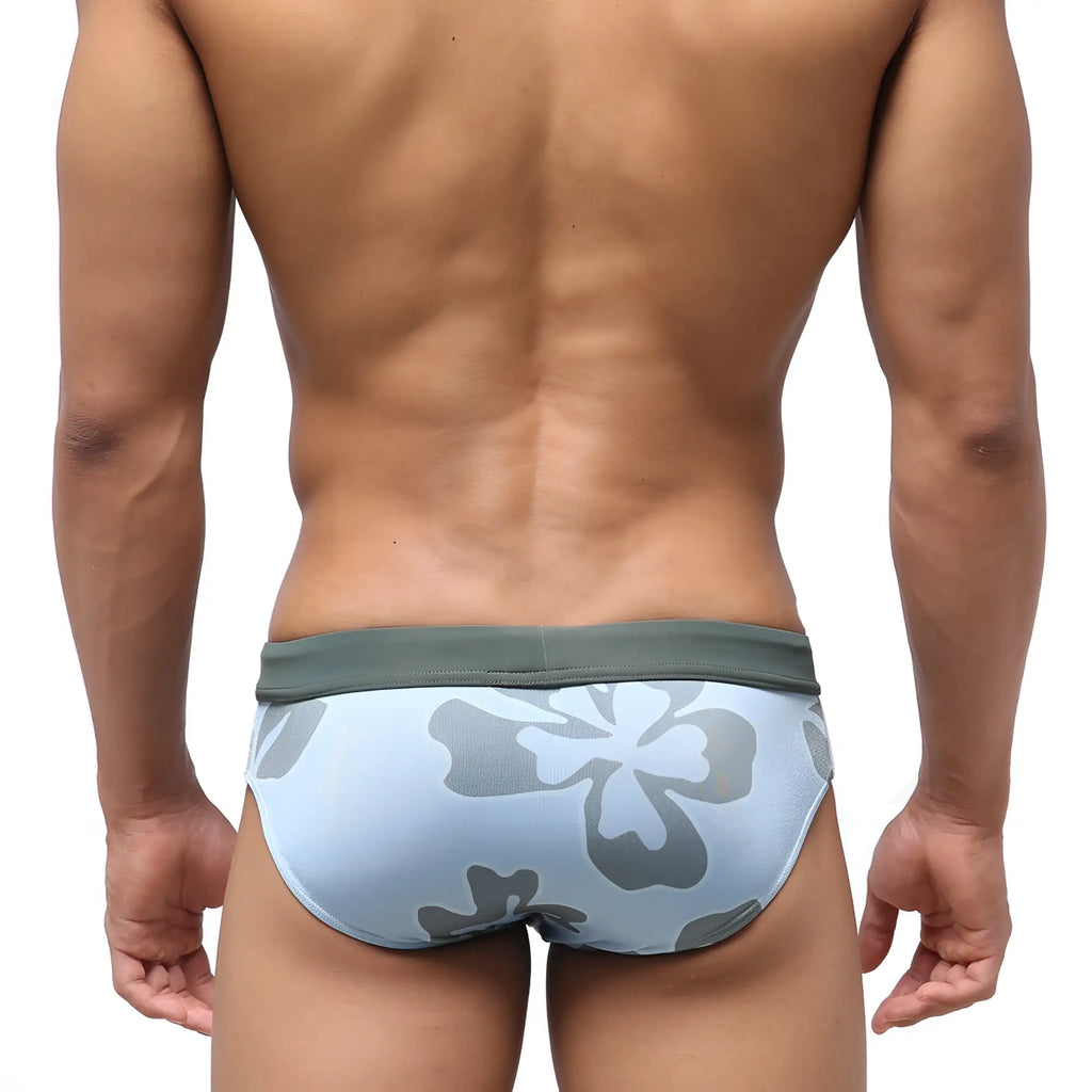 Light blue swim trunks with gray floral pattern and olive green waistband from MetroMaleWear nature swim brief 4916-52